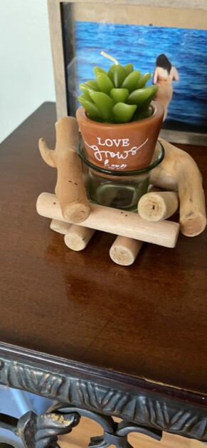 rustic wood candle holder on table